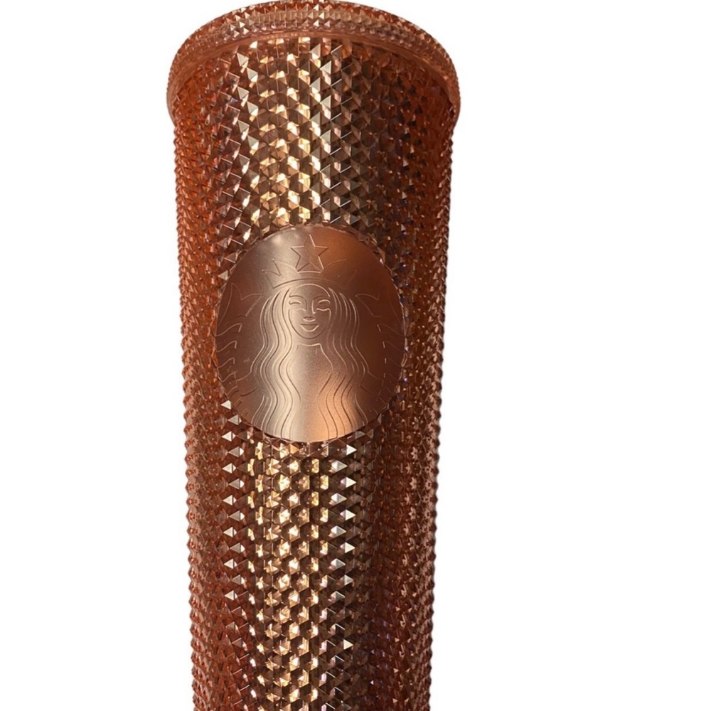 Starbucks rose gold tumbler.